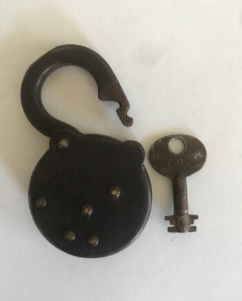 Antique metal padlock and key