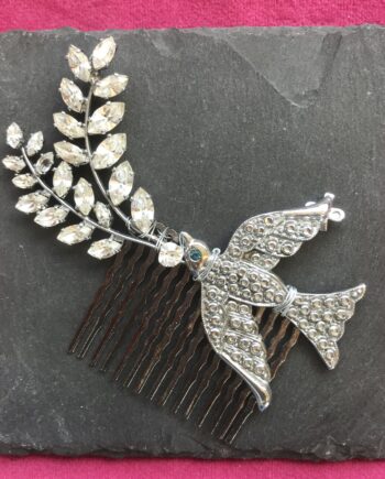 Bird and sprig hair comb
