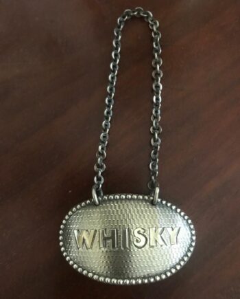 Silver plated whisky label